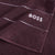 Closeup - Plain Burgundy Bath Towels by Hugo Boss | Fig Linens