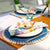 Capiz Blue Rattan and Seashell Placemats by Mode Living | Fig Linens