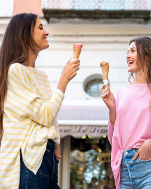 Mersea Catalina Sweater Limoncello Stripe | Shown on Model with a Friend eating ice cream