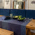 Caractere Coated Cotton Blue Tablecloths and Table Linens | Le Jacquard Français