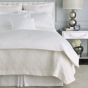 Lucia Pearl Coverlet by Peacock Alley shown with White Linens
